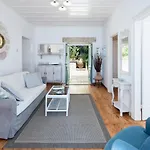 Beachfront Yellow House Upper Kaminaki